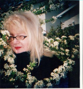 Marita (Stankitis) Brake amid apple blossoms, like her grandmother's