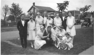 The Wedding Party; notice Kasawich home in left background and model T on right.