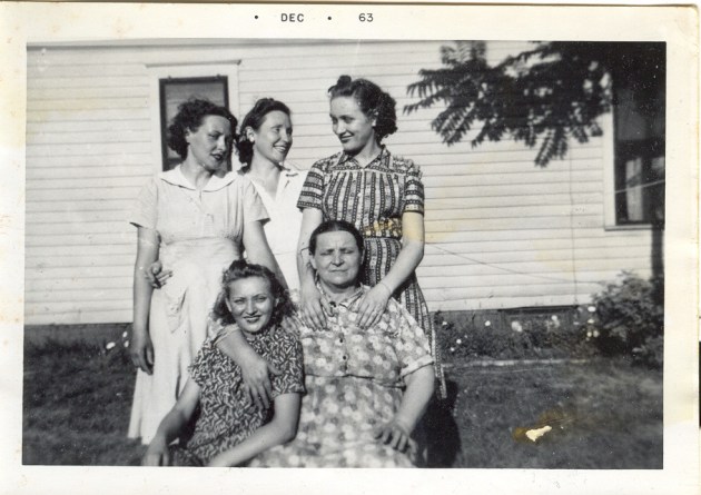 Agatha (Mankus) Tonila with four of her girls. Daughter Agnes (Tonila) Gooch with hands on her mother's shoulder.
