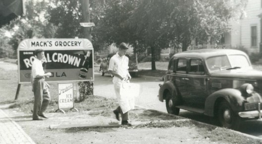 John’s younger brother Frank Makarauskas, 18,  carries a block of ice from the S. 1st St. store to a customer’s car.  1943 