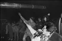 under the gun barrel of a tank firing deafening blank rounds