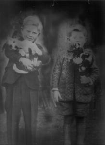 Little Yuskavich boys with puppy, flowers.