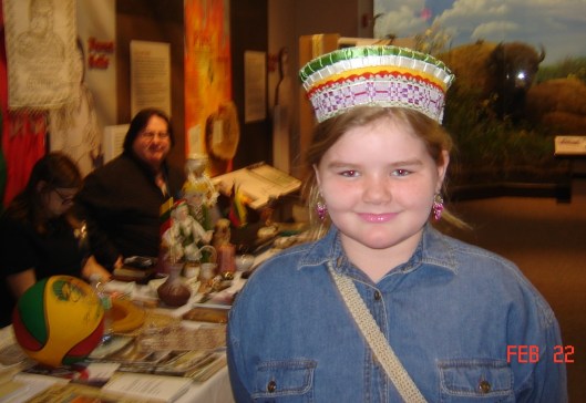 Young Carolyn wears the crown (karuna) of the Lithuanian national costume