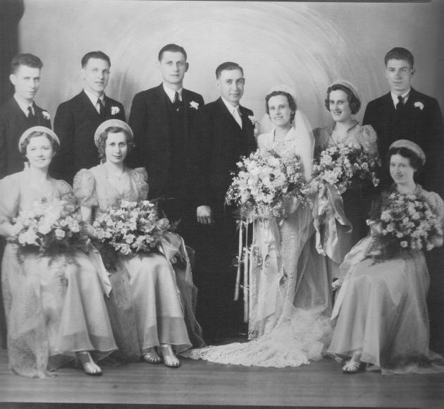 Josephine Yanor wedding to William Stankavich. Anna (Yanor) Carver on the bride's left. Front row second from left may be Monty Yanor.  Late 1930s?